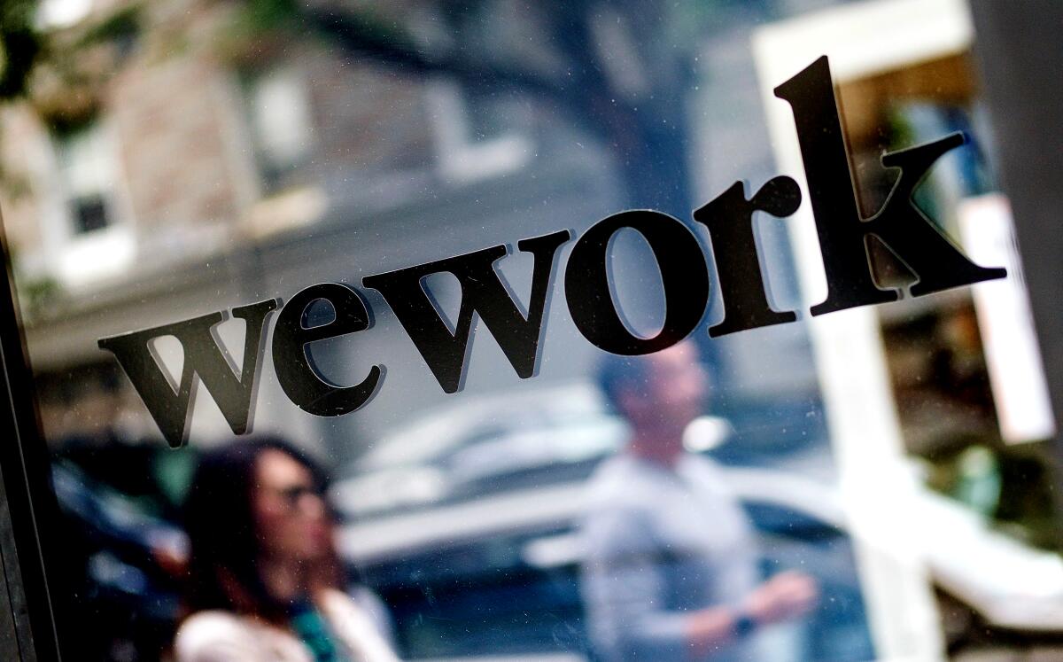 Wework Plans To Ax As Many As 4 000 Jobs Los Angeles Times