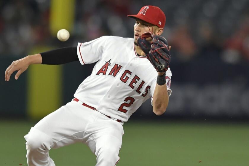 ANAHEIM, CA - APRIL 18: Dee Gordon #9 of the Seattle Mariners steals second base while Andrelton Simmons #2 of the Los Angeles Angels of Anaheim gets the throw late in the sixth inning at Angel Stadium of Anaheim on April 18, 2019 in Anaheim, California. (Photo by John McCoy/Getty Images) ** OUTS - ELSENT, FPG, CM - OUTS * NM, PH, VA if sourced by CT, LA or MoD **