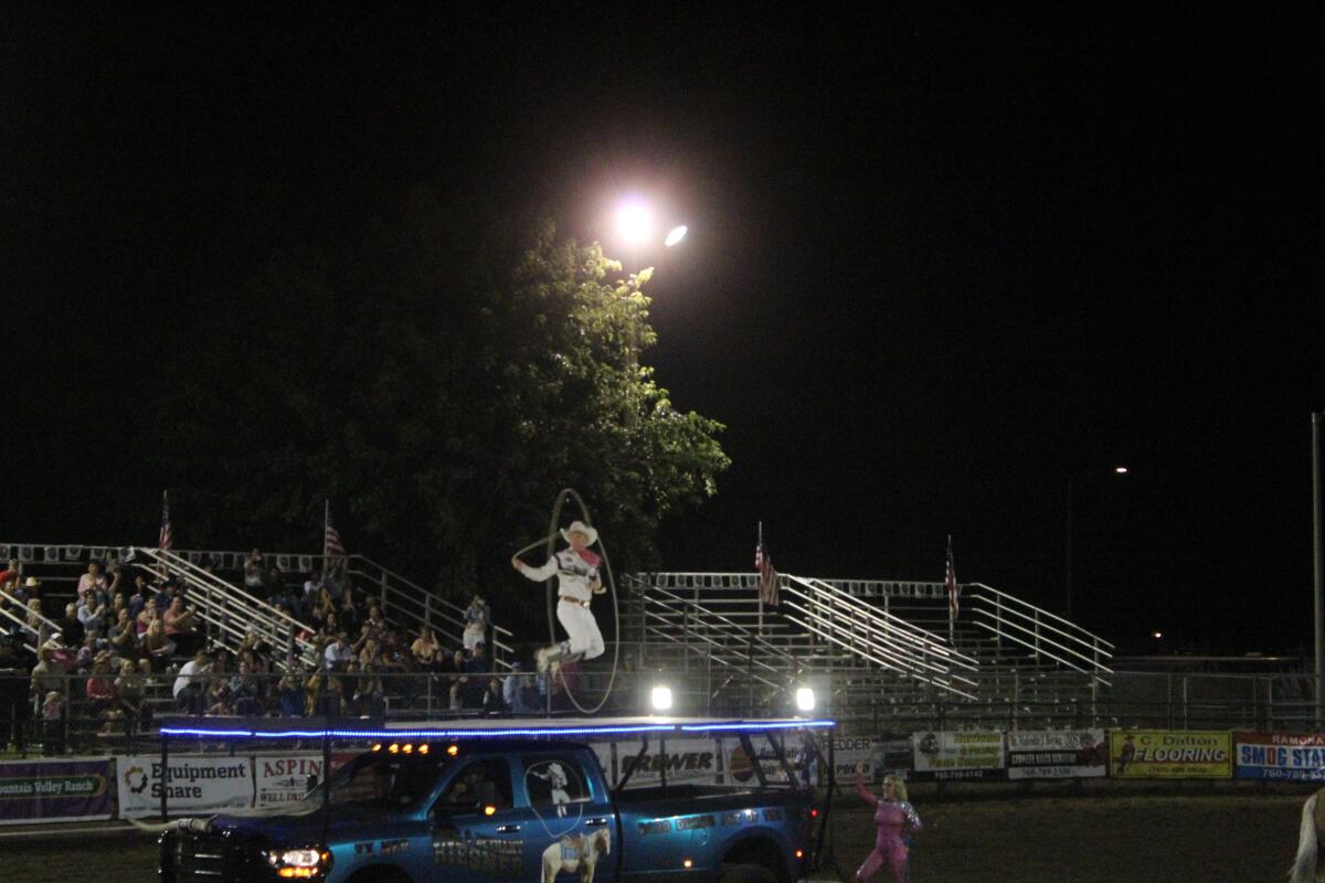 More trick roping on top of Rider Kiesner's truck.