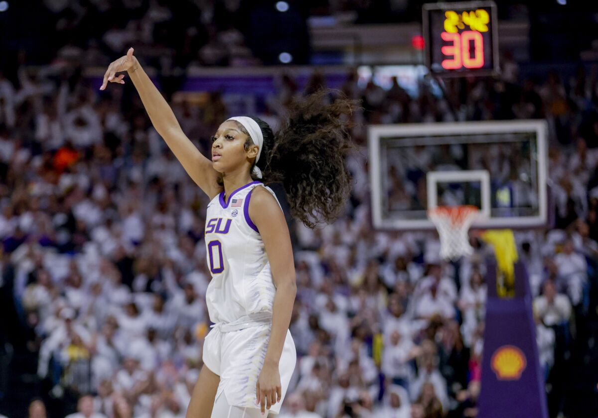 LSU forward Angel Reese (10) reacts after a score in the first half of an NCAA college basketball game against Tennessee in Baton Rouge, La., Monday, Jan. 30, 2023. (AP Photo/Derick Hingle)