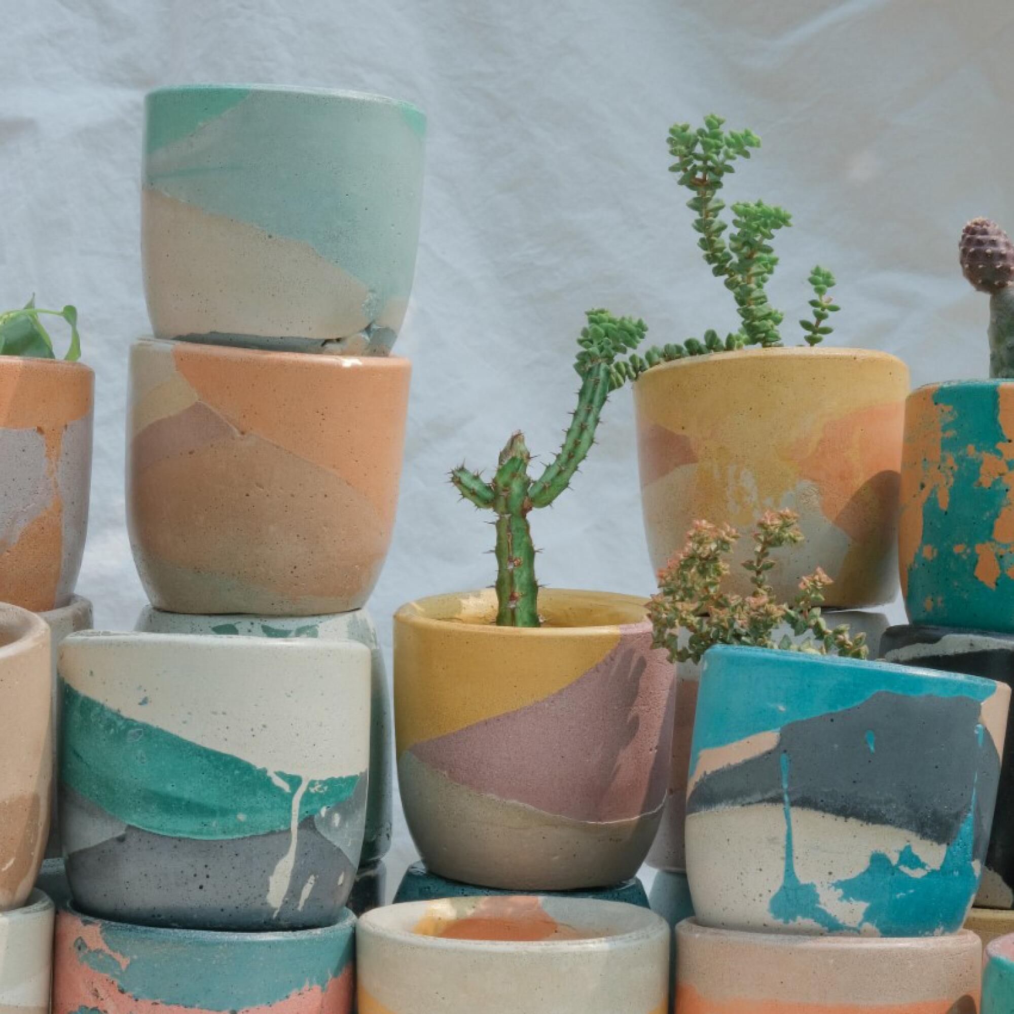 Krizia Flores' colorful concrete planters and votives