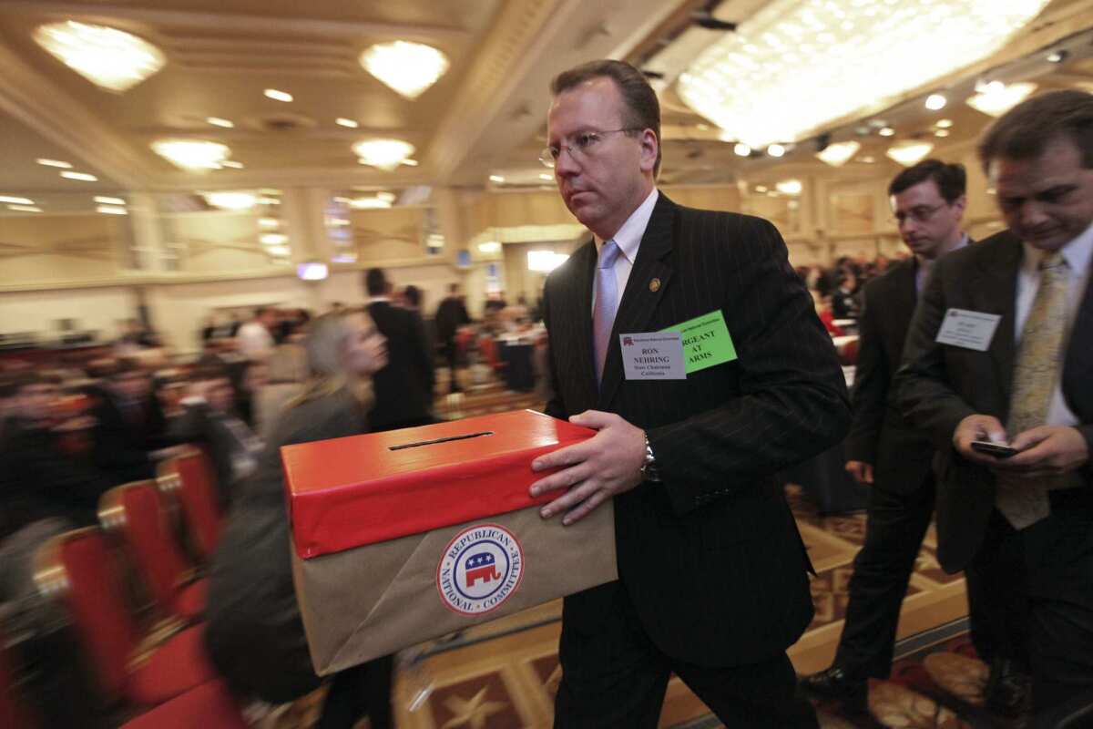 Ron Nehring, in his role as California Republican Party chairman, carries ballots to be tallied during elections at the Republican National Committee winter meetings in 2008. Nehring has announced he will run for lieutenant governor.