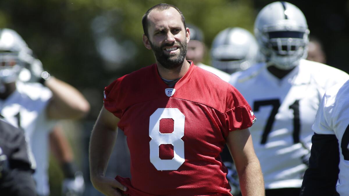 Oakland Raiders quarterback Matt Schaub walks with his teammates during minicamp in June. Schaub is hoping to salvage his NFL career with the Raiders.
