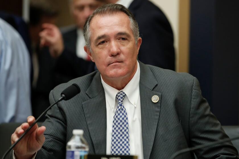 Rep. Trent Franks, R-Ariz., takes his seat before the start of a House Judiciary hearing on Capitol Hill in Washington, Thursday, Dec. 7, 2017, on Oversight of the Federal Bureau of Investigation. Franks says in a statement that he never physically intimidated, coerced or attempted to have any sexual contact with any member of his congressional staff. Instead, he says, the dispute resulted from a discussion of surrogacy. Franks and his wife have 3-year-old twins who were conceived through surrogacy. (AP Photo/Carolyn Kaster)