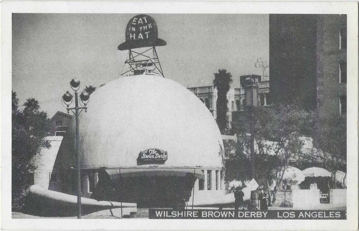 A black-and-white view of the exterior of the Brown Derby restaurant, which was shaped like a hat.