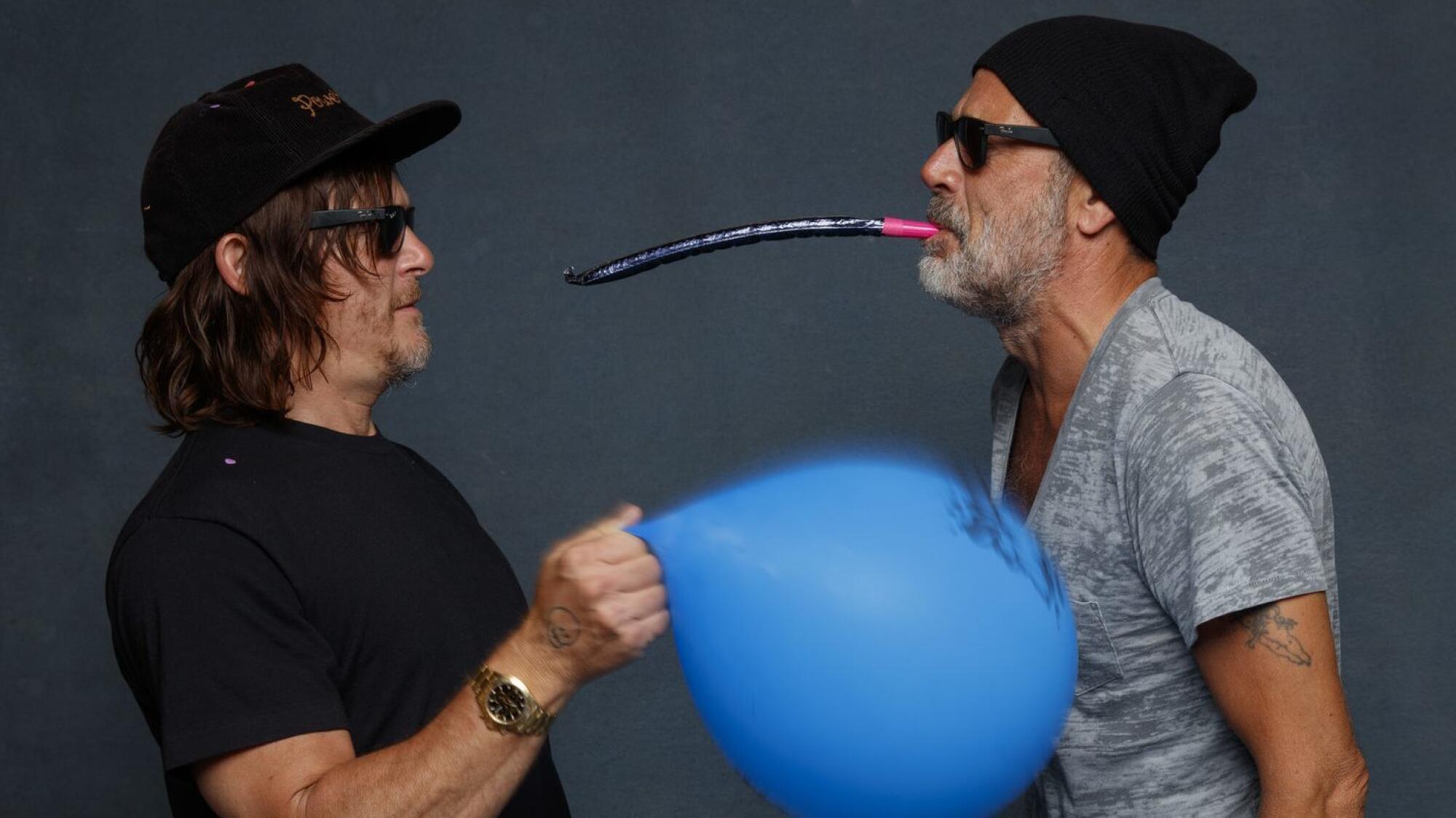Norman Reedus and Jeffrey Dean Morgan from the television series "The Walking Dead," photographed in 2018.