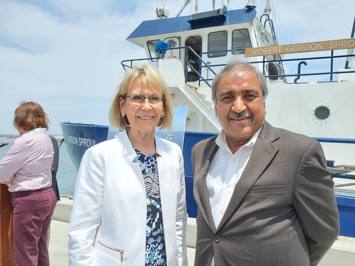Margaret Leinen, director of UC San Diego's Scripps Institution of Oceanography, stands with UCSD Chancellor Pradeep Khosla.