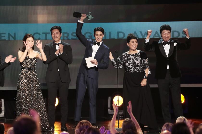 LOS ANGELES, CA - January 19, 2020: Park So-Dam, Lee Sun-Kyun, Choi Woo-Shik, Lee Jeong-eun and Song Kang-ho during the show at the 26th Screen Actors Guild Awards at the Los Angeles Shrine Auditorium and Expo Hall on Sunday, January 19, 2020. (Robert Gauthier / Los Angeles Times)