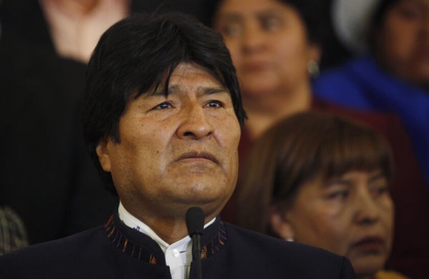 Bolivian President Evo Morales pauses during a news conference in La Paz, Bolivia.