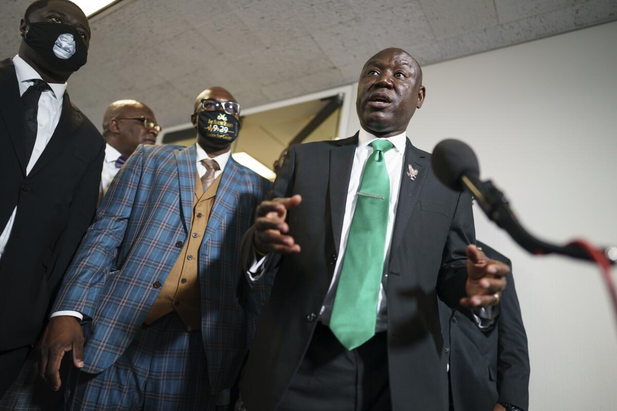 Ben Crump, the civil rights attorney representing the family of George Floyd, speaks to reporters
