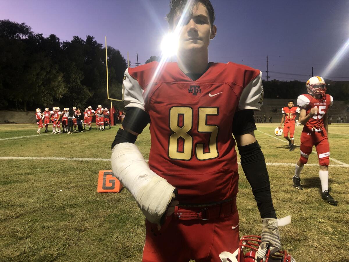 Freshman Ryan Quinn of Taft, despite still recovering from a broken wrist, is having fun playing for an 0-8 JV team while being new to the sport. He's a soccer player.