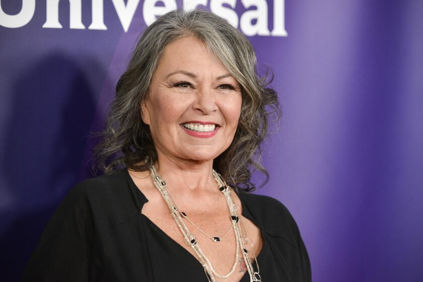 The parents of George Zimmerman have accused Roseanne Barr of posting their address and phone number on Twitter, causing them distress.