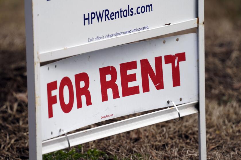 A "For Rent" sign is displayed along a neighborhood street in Mebane, N.C., Wednesday, Feb. 10, 2021. U.S consumers have so far defied higher prices for gas, food, and rent and have been spending more in 2022, providing crucial support to the economy. How long that can continue will be one of the key factors affecting the economy and inflation this year. (AP Photo/Gerry Broome)
