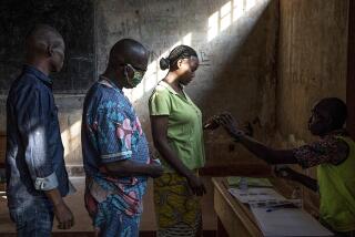 People cast their votes Sunday at a polling station in Bangui, Central African Republic.