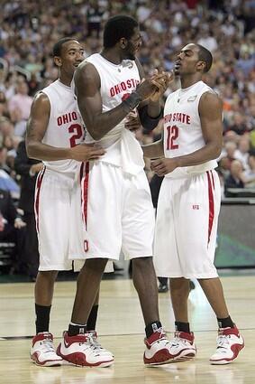 Greg Oden of the Ohio State Buckeyes reacts with Ron Lewis and David Lighty after a play against the Georgetown Hoyas.