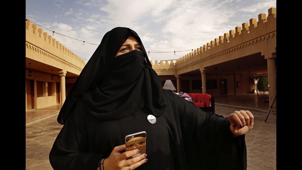 Mai Al-Rwaili, of Al-Nahda Philanthropic Society for Women, voted Saturday in the first election women have been allowed to vote in Saudi Arabia.