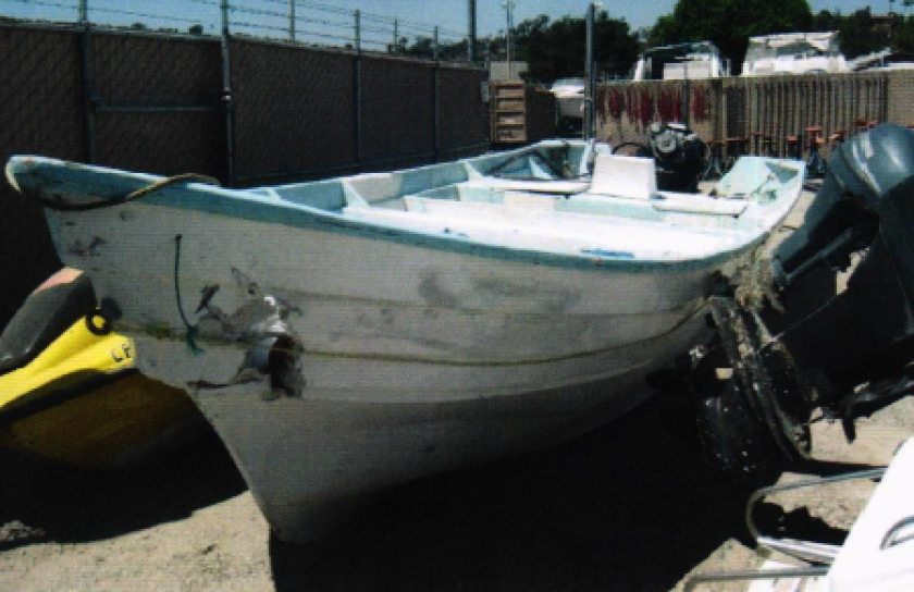 Damage is visible on the front end of a boat whose captain used it to ram a Coast Guard vessel in August 2020 off San Diego.