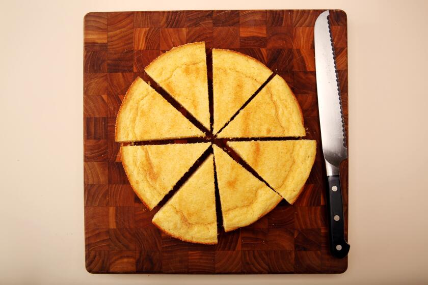 LOS ANGELES, CA - SEPTEMBER 11: Garlic Skillet Cornbread is photographed on a cutting board in Mar Vista on Friday, Sept. 11, 2020 in Los Angeles, CA. (Dania Maxwell / Los Angeles Times)
