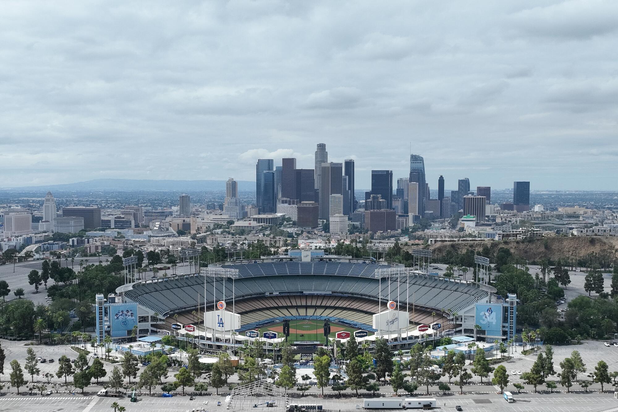 Clouds hang over downtown from a hill overlooking Dodgers Stadium on Aug. 21.