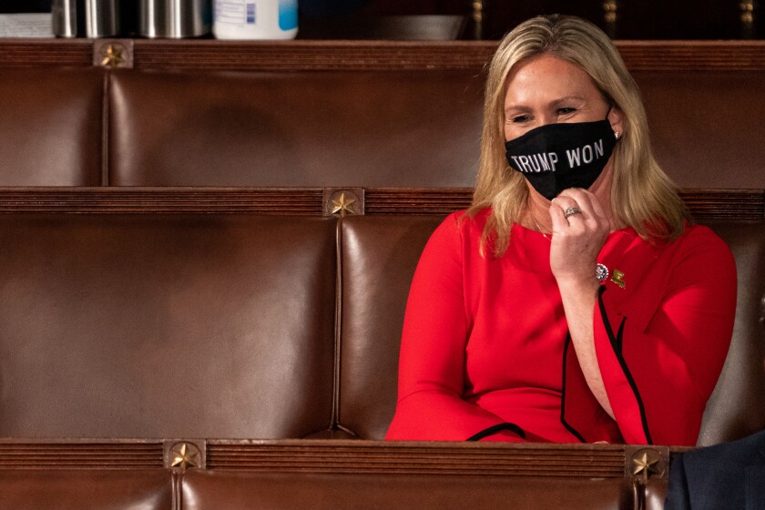 Rep. Marjorie Taylor Greene (R-GA) sits in the House Chamber on Sunday, Jan. 3, 2021