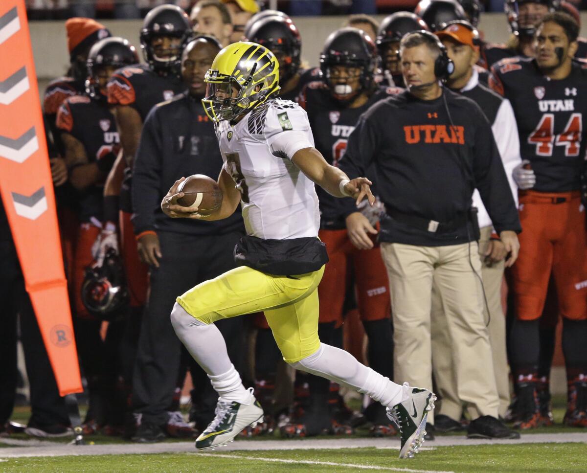 Oregon quarterback Marcus Mariota rushed for 114 yards in 18 carries with a touchdown to go with his 239 passing yards with three touchdowns during the Ducks' 51-27 win over Utah.