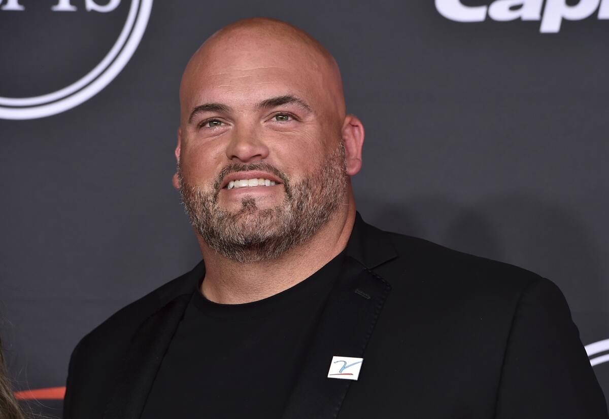 FILE - Andrew Whitworth arrives at the ESPY Awards on Wednesday, July 20, 2022, at the Dolby Theatre in Los Angeles. With less than two months before its first regular season game, Prime Video’s crew for “Thursday Night Football” is nearly set. Kaylee Hartung has been hired by Amazon as the sideline reporter while Andrew Whitworth and Aqib Talib have signed on as contributors for pregame, halftime and postgame coverage.(Photo by Jordan Strauss/Invision/AP)