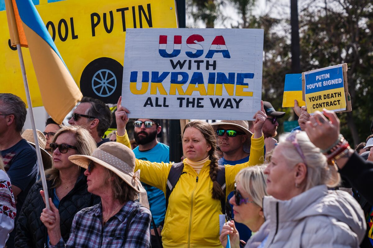 Hundreds gather for "Stand with Ukraine" rally at Balboa Park on February 27, 2022.
