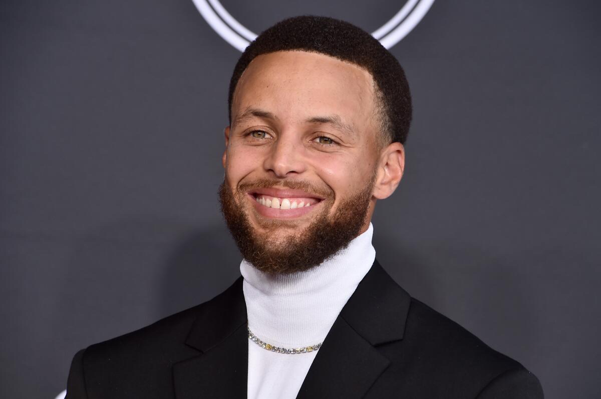 FILE - NBA basketball player Stephen Curry, of the Golden State Warriors, arrives at the ESPY Awards in Los Angeles on July 20, 2022. Curry has a new children's book "I Have a Superpower.” (Photo by Jordan Strauss/Invision/AP, File)
