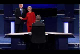 Hillary Clinton and Donald Trump shake hands to begin the first Presidential Debate