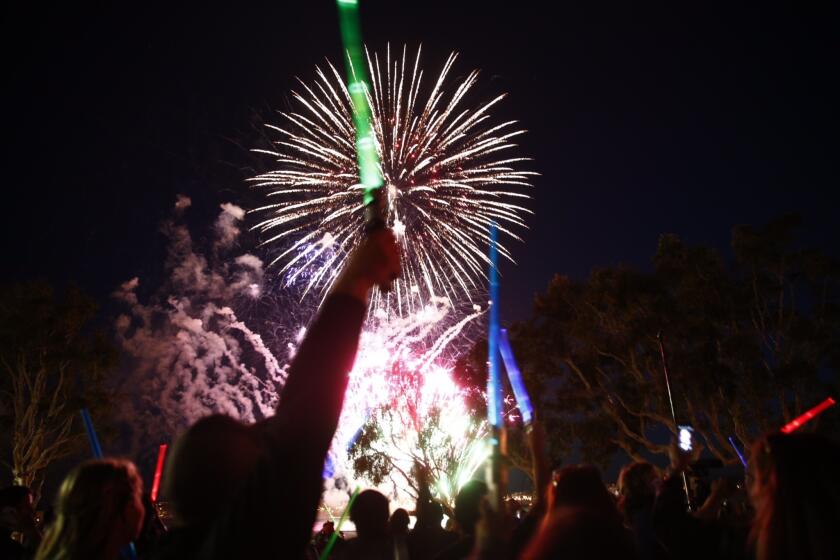 A surprise concert for "Star Wars" fans included free lightsabers and fireworks.