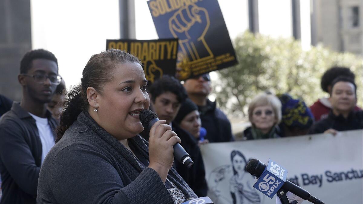 Martha Arévalo, executive director of the Central American Resource Center in Los Angeles, speaks at a news conference announcing a lawsuit against the Trump administration over its TPS decision. In California, about 55,000 immigrants are protected by TPS, most from El Salvador.