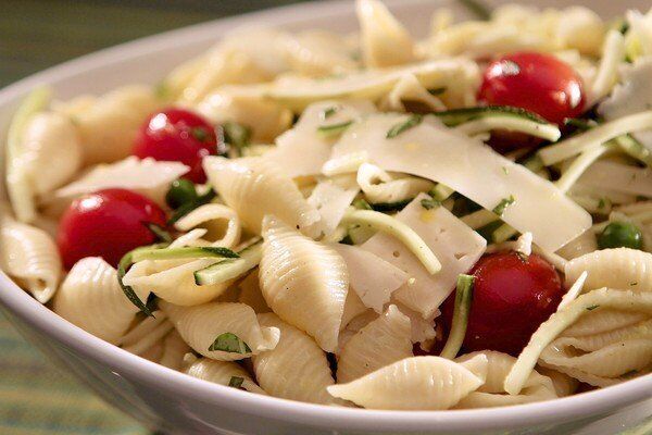 Sweet cherry tomatoes and vibrant zucchini strips lend bright colors to this pasta salad, and the fresh lemon zest adds a nice zing. Recipe: Shell pasta salad
