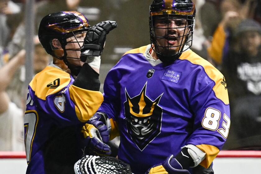 San Diego Seals' Austin Staats, right, is congratulated by Kyle Jackson, left, after Staats scored during a lacrosse game against the Colorado Mammoth at Pechanga Arena February, 4, 2024 in San Diego, Calif. (Photo by Denis Poroy)