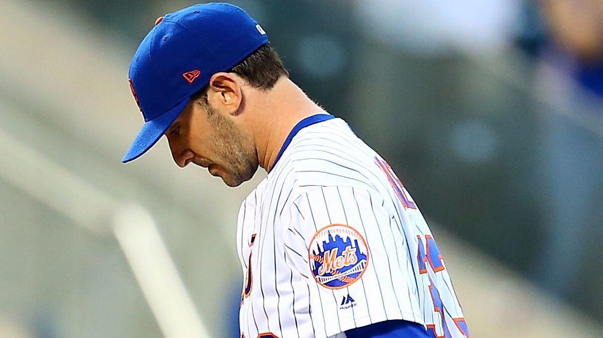 New York Mets pitcher Matt Harvey reacts after giving up a home run in the fourth inning to the Chicago Cubs, Wednesday.