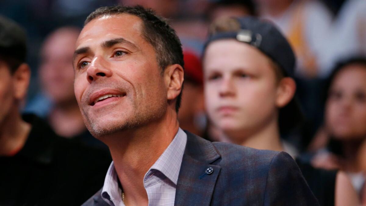 New General Manager Rob Pelinka attends the Lakers' game against Philadelphia on March 12.