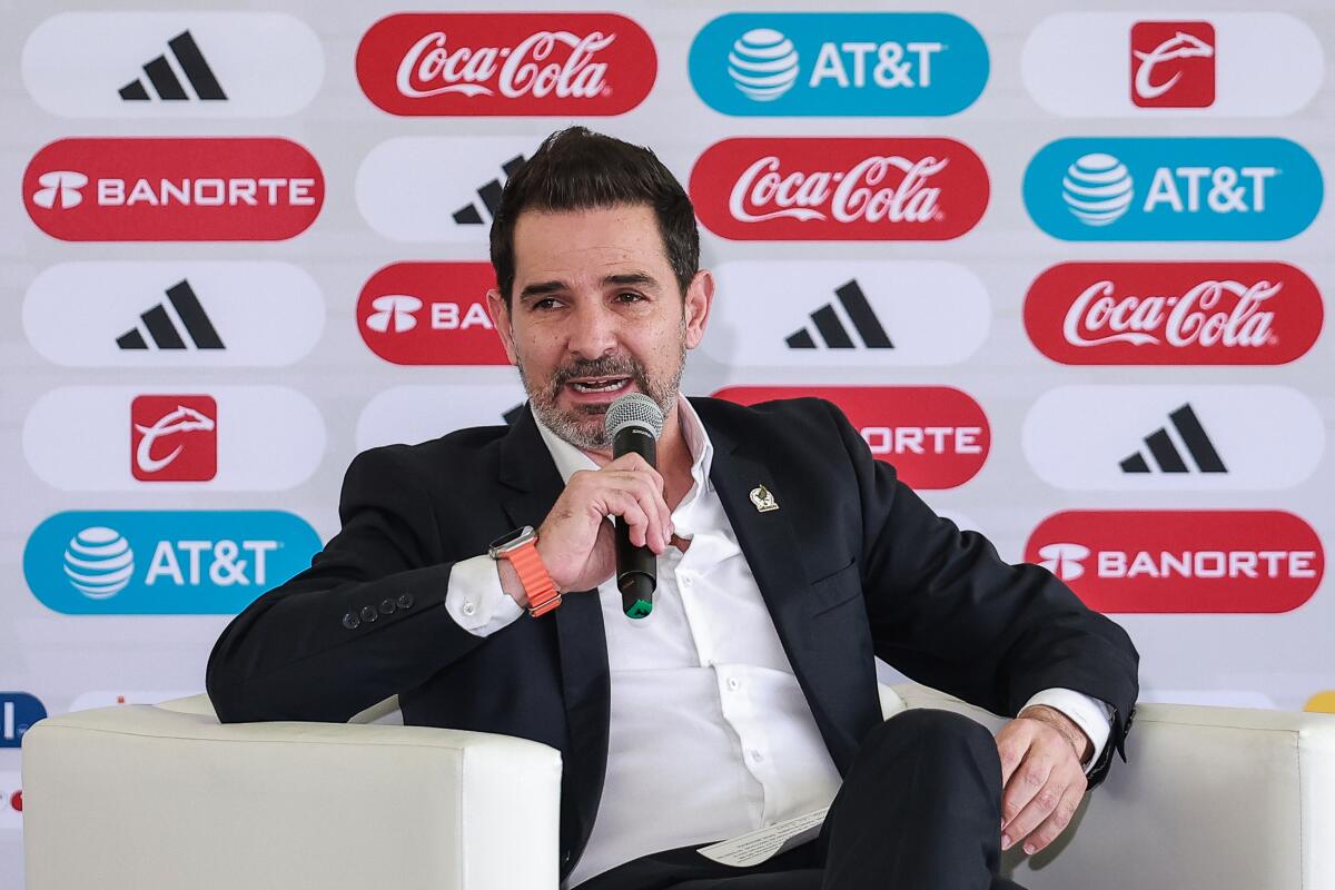 Duilio Davino, director of the Mexican men's national team program, speaks during a news conference on Aug. 1.