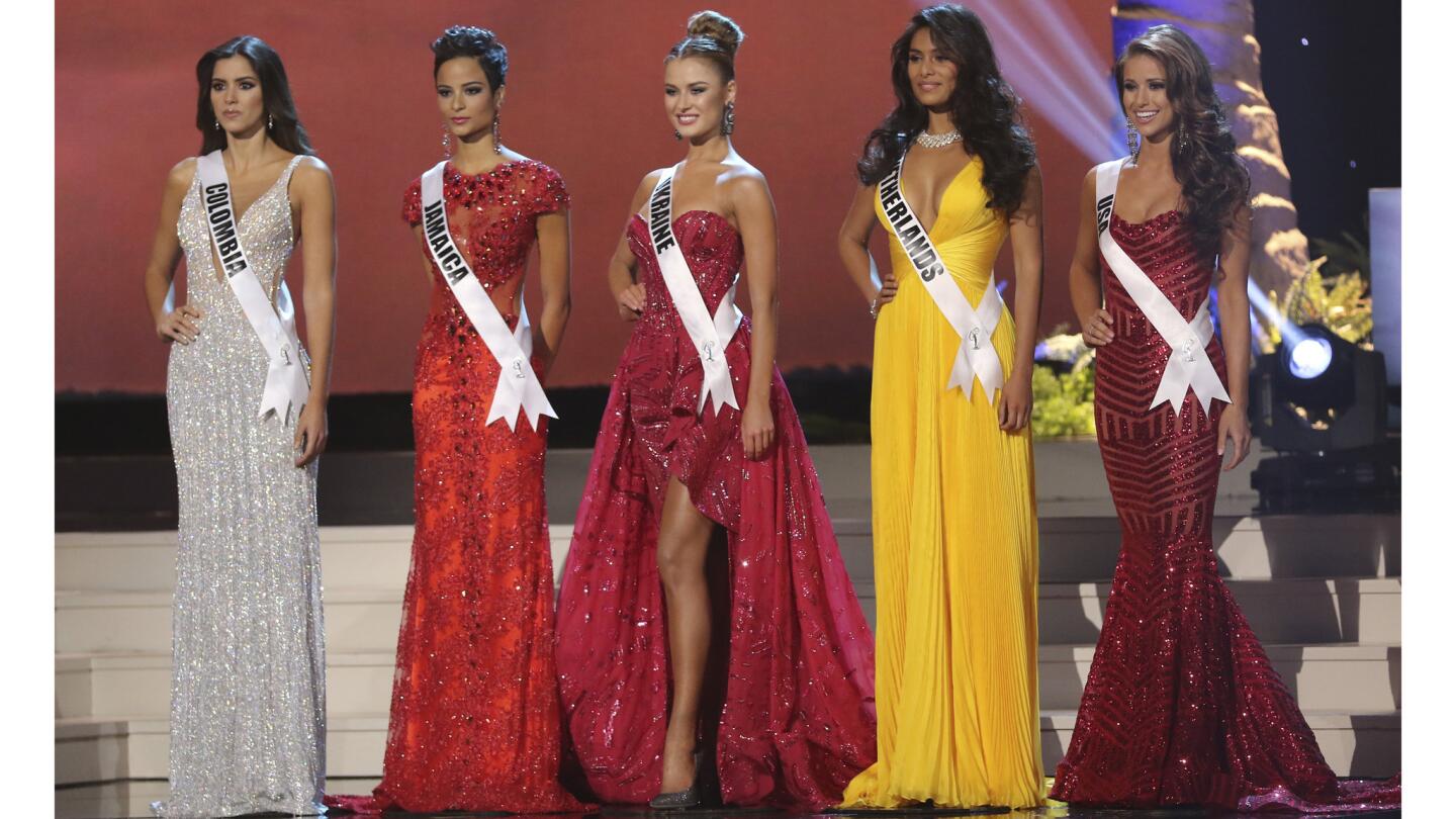 Miss Colombia Paulina Vega, left, Miss Jamaica Kaci Fennell, Miss Ukraine Diana Harkusha, Miss Netherlands Yasmin Verheijen and Miss USA Nia Sanchez were the five finalists Jan. 25 during the 63rd Miss Universe Pageant.
