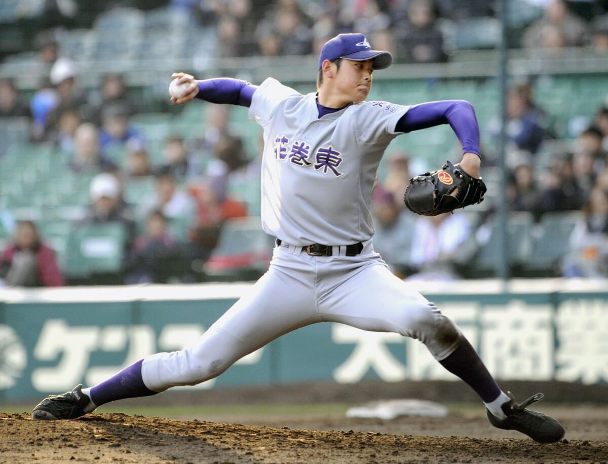 Hanamaki Higashi's Shohei Ohtani throws against Osaka Toin during a game of the national high school baseball tournament in Nishinomiya, western Japan, on March 21, 2012. Ohtani of the Los Angeles Angels is arguably the greatest baseball player in the history of the game. His roots are deep in northeastern Japan where he played high school baseball and got his start. (Kyodo News via AP)