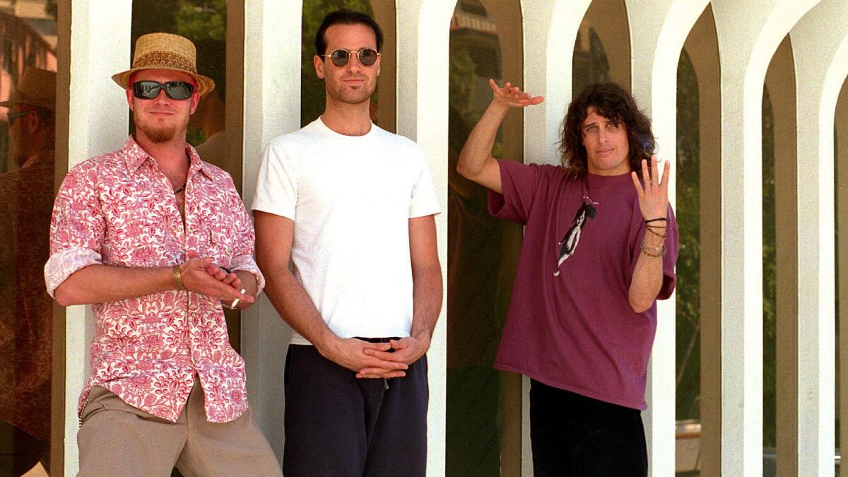 Three of the 4 members of the San Diego–based Stone Temple Pilots hanging out near the offices of their publisists. Scott Weiland, left, Robert Deleo, and Dean Deleo. Missing is drummer Eric Kretz.