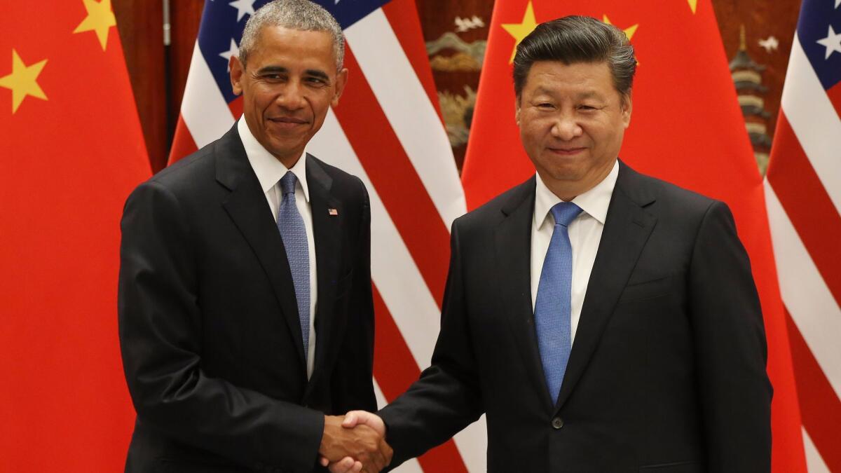 President Obama and Chinese President Xi Jinping shake hands during their meeting at the West Lake State Guest House in Hangzhou, China, on Sept. 3, 2016.