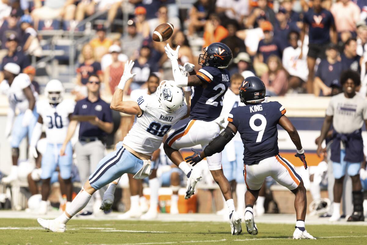 Virginia's Jaylon Baker breaks up a catch during a game against Old Dominion in Charlottesville, Va., on Saturday, Sept. 17, 2022. (Mike Kropf/The Daily Progress via AP)