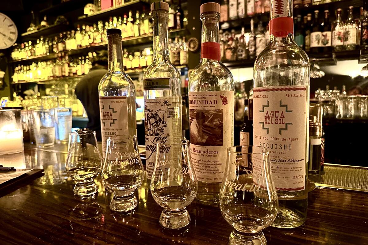 Neat, a moody West L.A. dive bar, offers mezcal flights featuring small-batch labels.