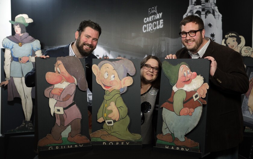 The 30-person team of the Walt Disney Archives is overseen in part by exhibition manager Robert Maxhimer, left, director Becky Cline and research manager Kevin Kern. 