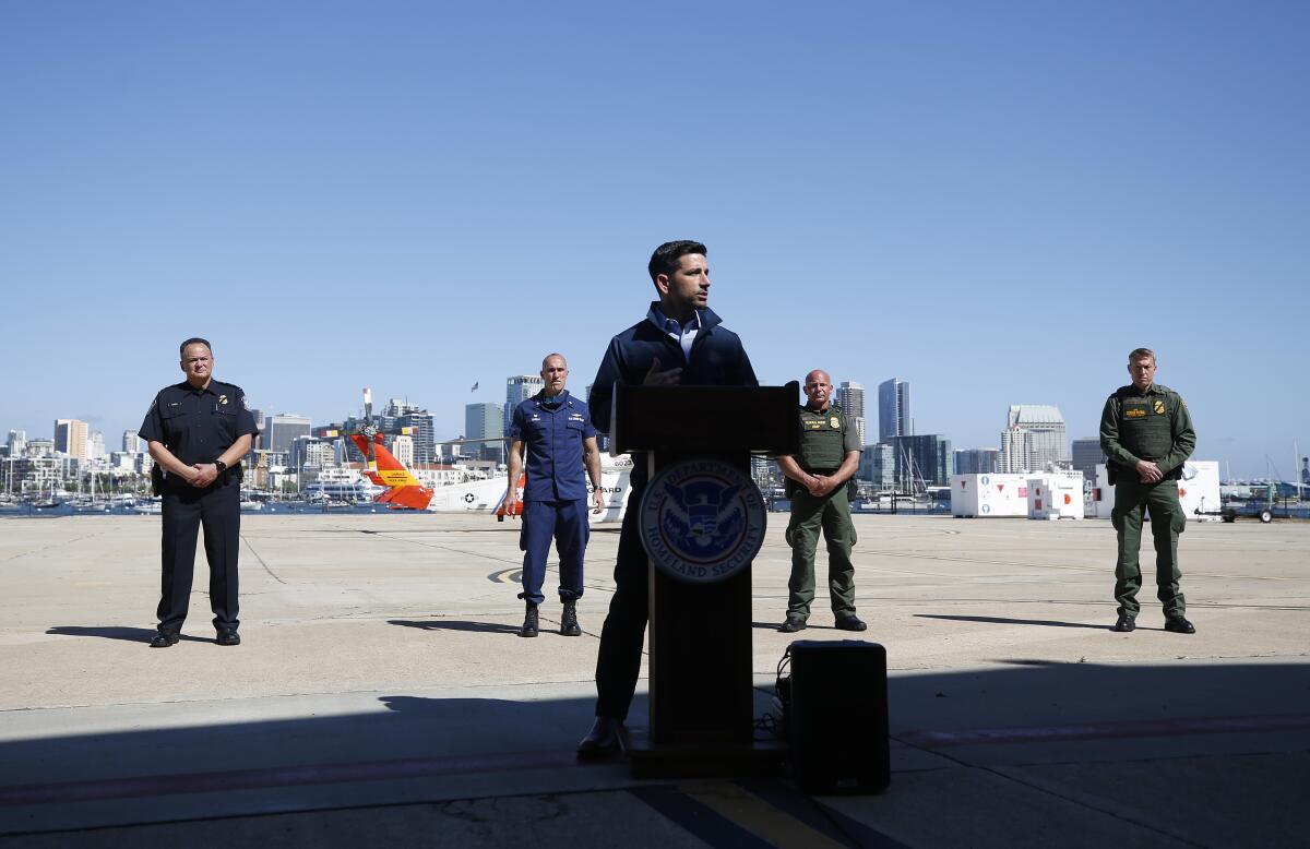 Chad F. Wolf, acting Secretary of Homeland Security speaks with reporters at the U.S. Coast Guard Sector San Diego after taking a helicopter tour of the San Ysidro Port of Entry on May 13, 2020.