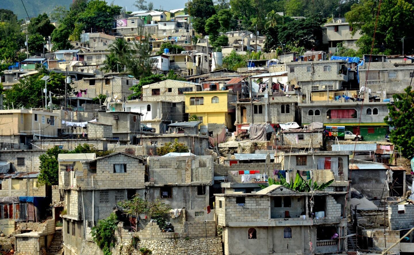 Petionville, one of the towns that makes up the sprawling metropolis of Port-au-Prince, is composed of narrow passages and stairs between concrete buildings that spill down the ubiquitous hills of Haiti before hitting bottom and starting the climb back up.