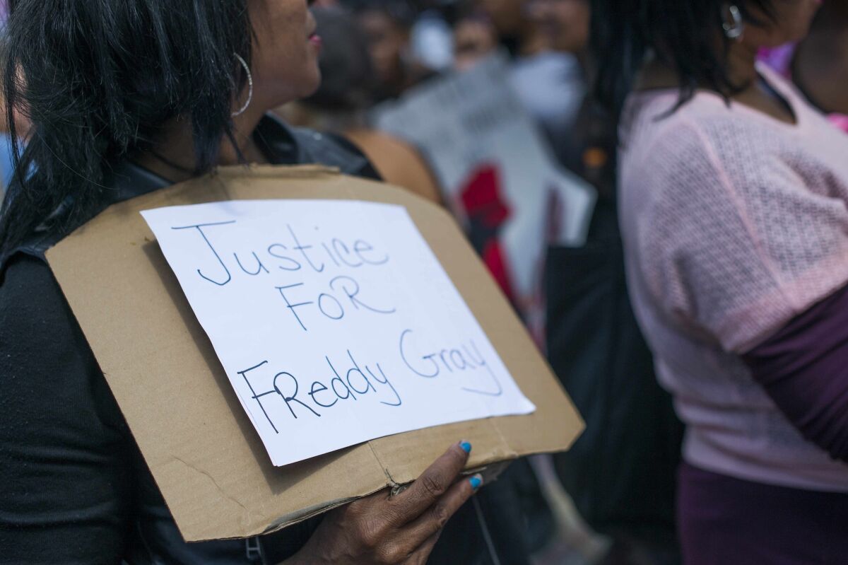 Thousands of people protested in Baltimore in fresh demonstrations on Saturday, a day after six police officers were charged over the death of Freddie Gray.