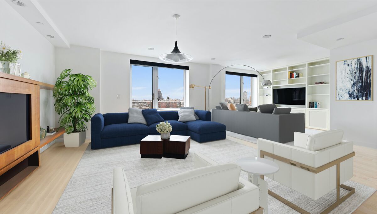 The three-bedroom unit includes a private balcony and access to a rooftop deck.