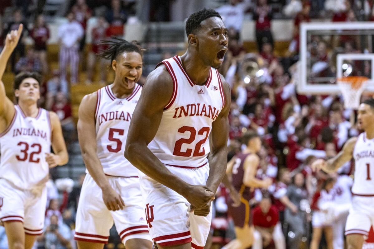 Indiana forward Jordan Geronimo (22) reacts after an Indiana score against Bethune-Cookman during the first half of an NCAA college basketball game Thursday, Nov. 10, 2022, in Bloomington, Ind. (AP Photo/Doug McSchooler)
