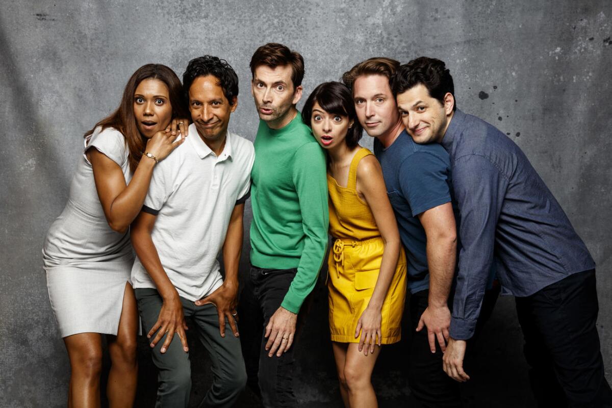 Toks Olagundoye, left, Danny Pudi, David Tennant, Kate Micucci, Beck Bennett and Ben Schwartz from "DuckTales" visit the L.A. Times photo studio.