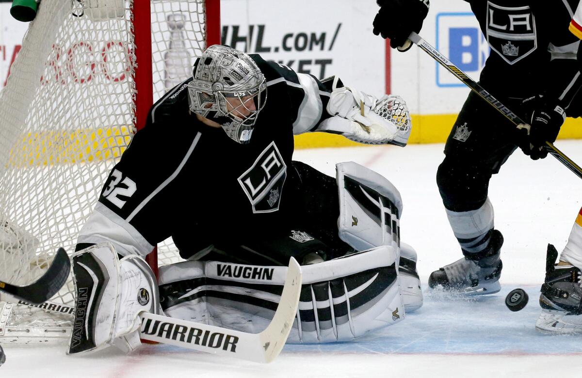 Kings goalie Johnathan Quick makes a save against the Flames in the second period. Quick recorded his fifth shutout of the season.
